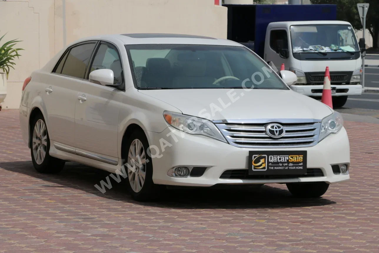 تويوتا  أفالون  اكس ال  2012  اوتوماتيك  201,000 كم  6 سلندر  سحب امامي  سيدان  أبيض لؤلؤي