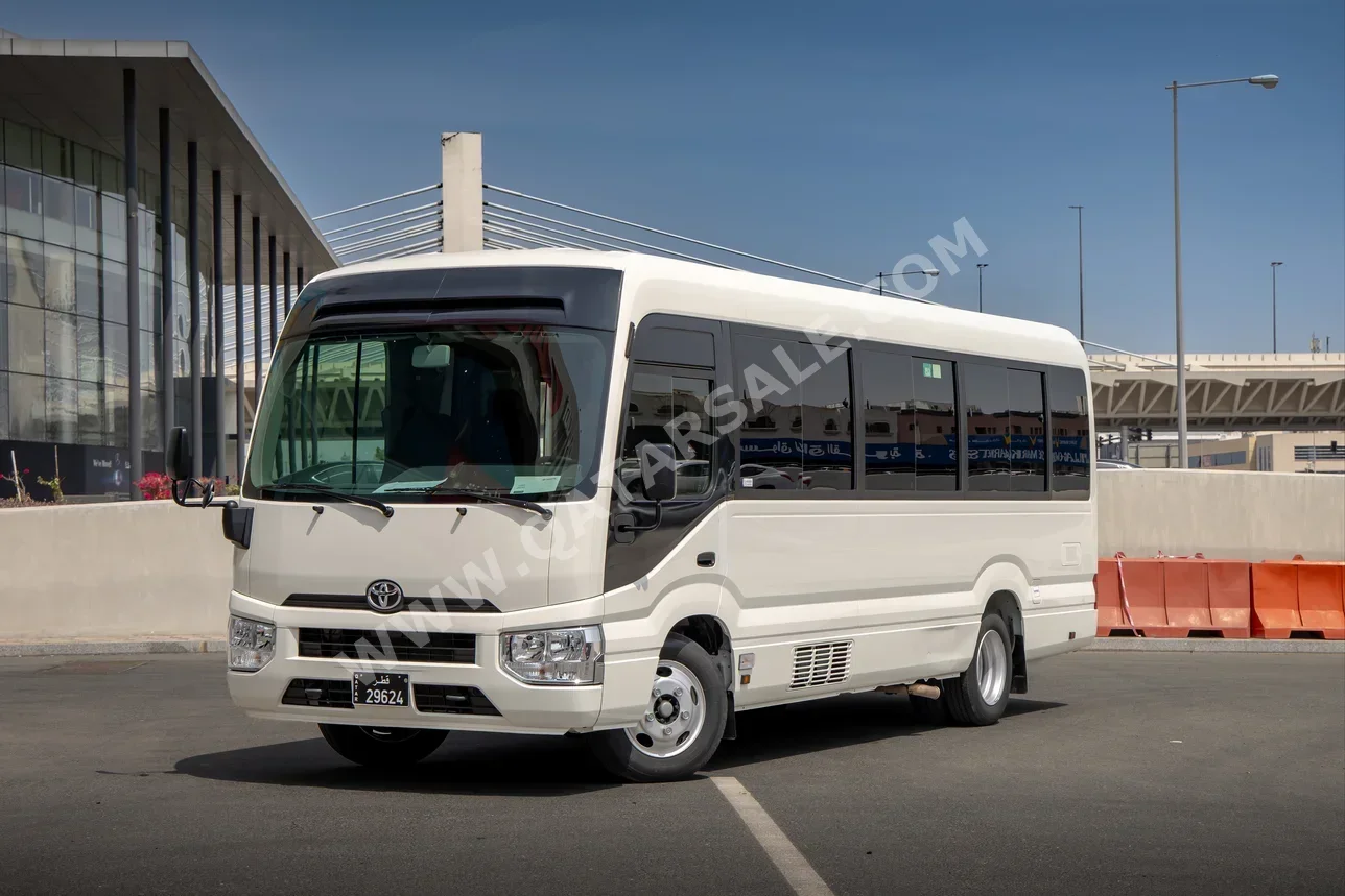 Toyota  Coaster  2025  Manual  21,000 Km  4 Cylinder  Rear Wheel Drive (RWD)  Van / Bus  White  With Warranty