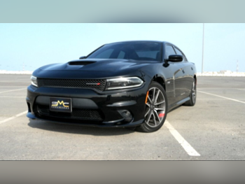 Dodge  Charger  RT  2023  Automatic  64,000 Km  8 Cylinder  Rear Wheel Drive (RWD)  Sedan  Black  With Warranty
