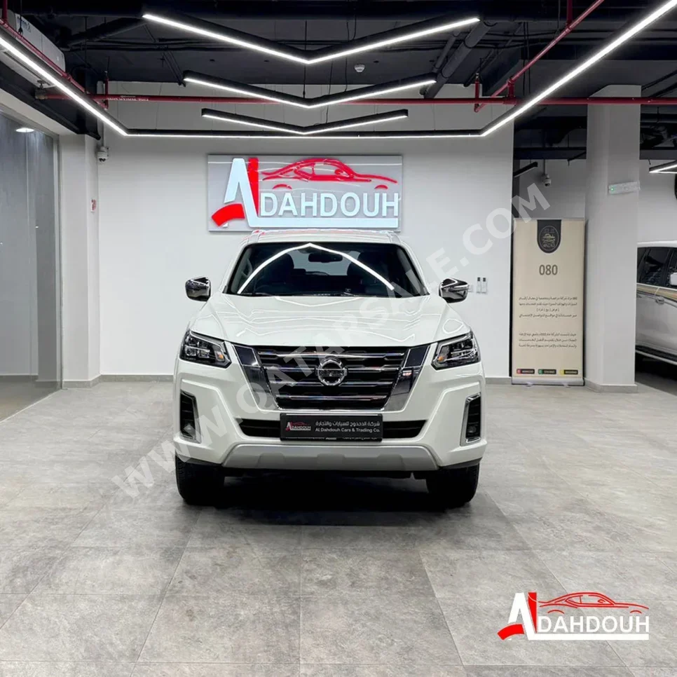 Nissan  Xterra  Titanium  2023  Automatic  50,000 Km  4 Cylinder  Four Wheel Drive (4WD)  SUV  White  With Warranty