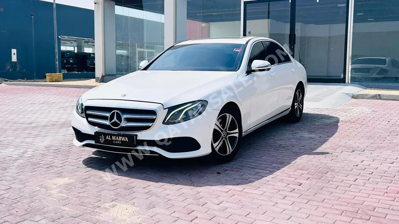Mercedes-Benz  E-Class  200  2020  Automatic  116,000 Km  4 Cylinder  Rear Wheel Drive (RWD)  Sedan  White