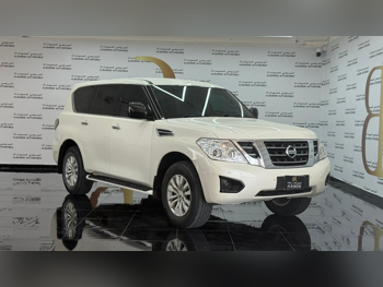 Nissan  Patrol  XE  2019  Automatic  167,000 Km  6 Cylinder  Four Wheel Drive (4WD)  SUV  White