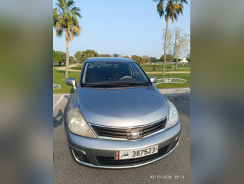 نيسان  تيدا  2011  اوتوماتيك  372,205 كم  4 سلندر  سحب امامي  سيدان  رمادي كاربيثيان