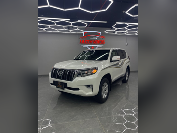 تويوتا  برادو  تي اكس ال  2019  اوتوماتيك  110,000 كم  6 سلندر  دفع رباعي  اس يو في  أبيض