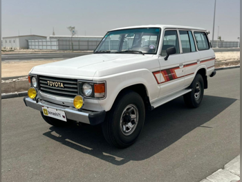 تويوتا  لاند كروزر  جي  1982  عادي  301,831 كم  6 سلندر  دفع رباعي  اس يو في  أبيض