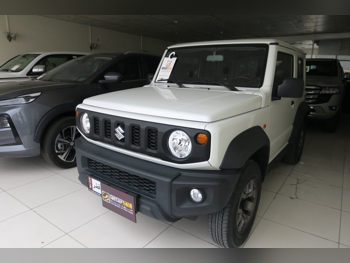 Suzuki  Jimny  2023  Manual  12,000 Km  4 Cylinder  Four Wheel Drive (4WD)  SUV  White  With Warranty