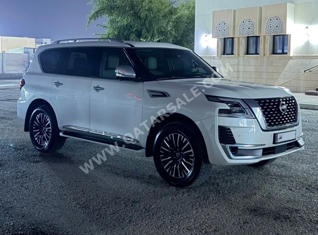 Nissan  Patrol  Platinum  2024  Automatic  80,000 Km  6 Cylinder  Four Wheel Drive (4WD)  SUV  White  With Warranty