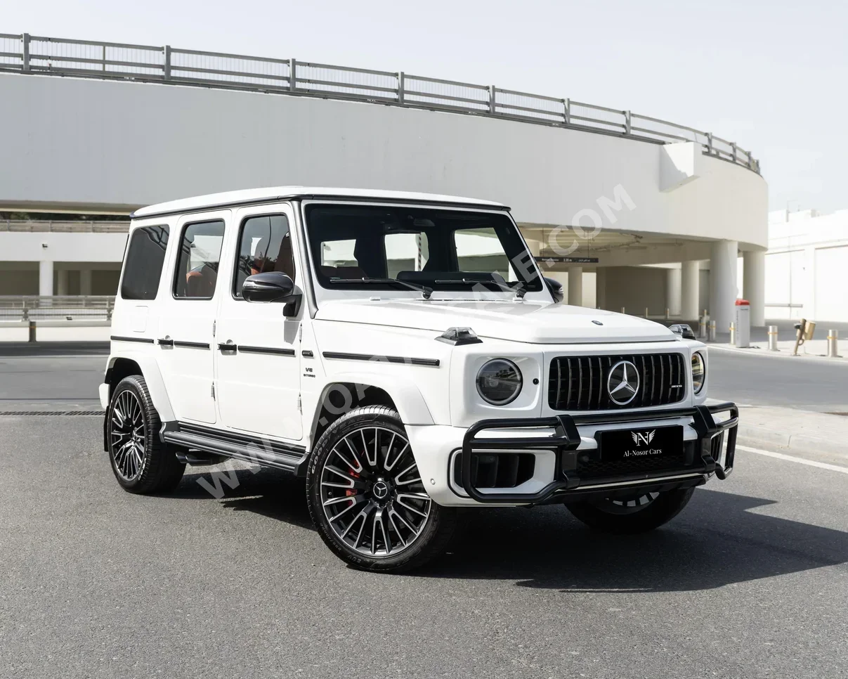 مرسيدس - بنز  جي - كلاس  63 اي ام جي  2025  اوتوماتيك  17,000 كم  8 سلندر  دفع رباعي  اس يو في  أبيض  تحت الضمان