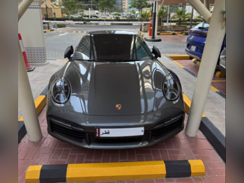 بورش  911  توربو  2023  اوتوماتيك  13,500 كم  6 سلندر  دفع كلي مستمر  كوبيه \ سبورت  رمادي  تحت الضمان