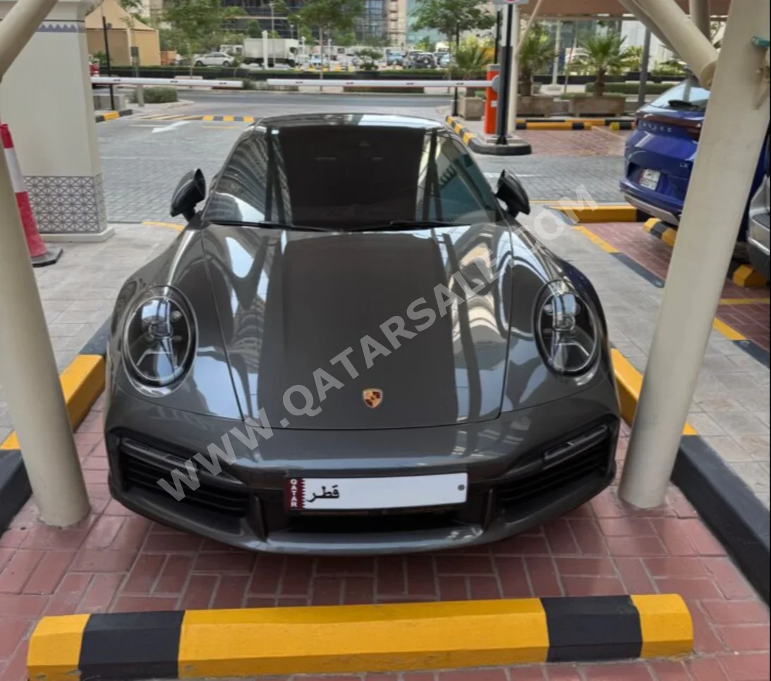 بورش  911  توربو  2023  اوتوماتيك  13,500 كم  6 سلندر  دفع كلي مستمر  كوبيه \ سبورت  رمادي  تحت الضمان
