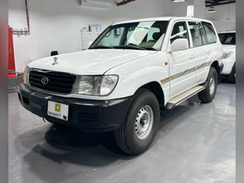 تويوتا  لاند كروزر  جي اكس  2000  عادي  212,582 كم  6 سلندر  دفع رباعي  اس يو في  أبيض