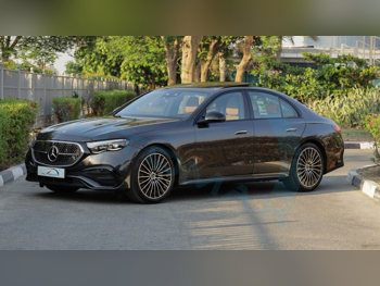 مرسيدس - بنز  اي - كلاس  300 AMG  2026  اوتوماتيك  0 كم  4 سلندر  دفع خلفي  سيدان  رمادي غامق  تحت الضمان