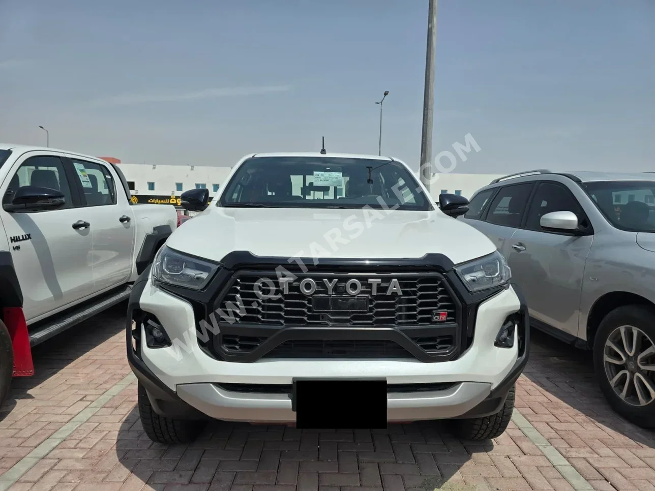 تويوتا  هاي لوكس  جي ار سبورت  2025  اوتوماتيك  1 كم  6 سلندر  دفع رباعي  بيكب  أبيض  تحت الضمان
