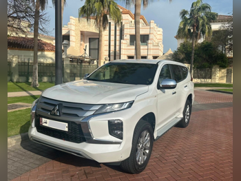 Mitsubishi  Pajero  Montero Sport  2023  Automatic  32,000 Km  6 Cylinder  Four Wheel Drive (4WD)  SUV  White  With Warranty