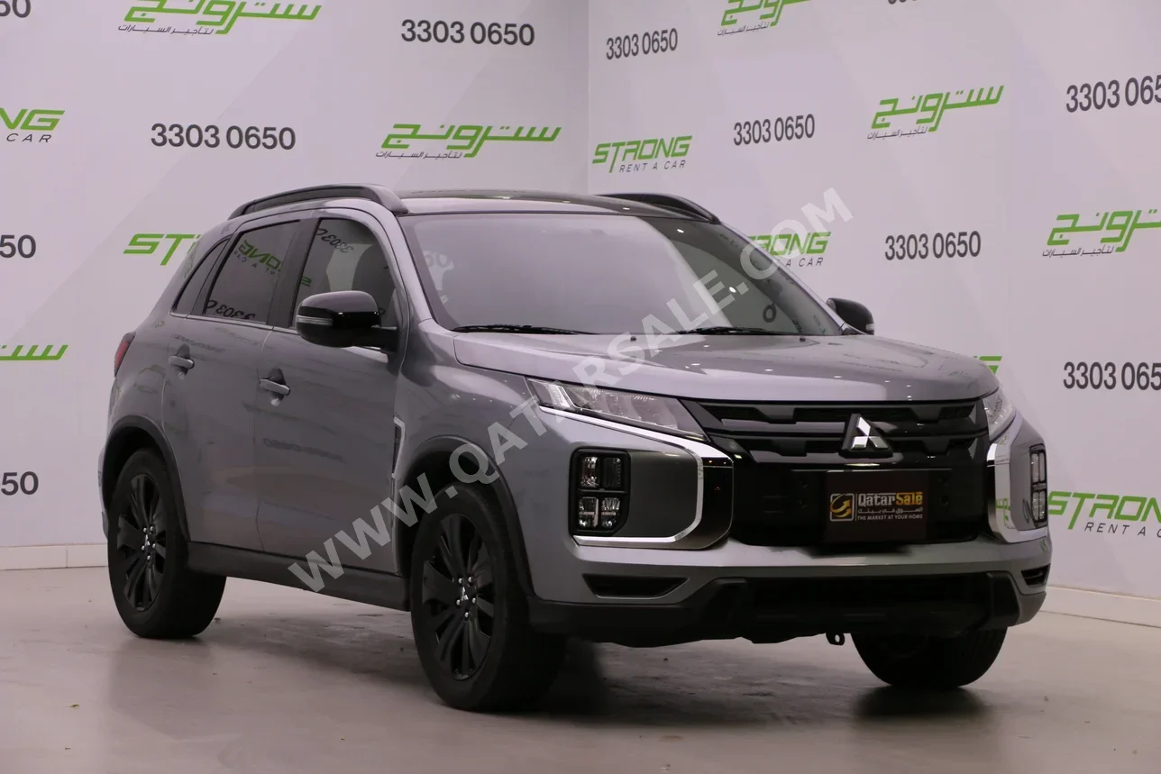 Mitsubishi  ASX  2024  Automatic  25,250 Km  4 Cylinder  Front Wheel Drive (FWD)  SUV  Gray  With Warranty