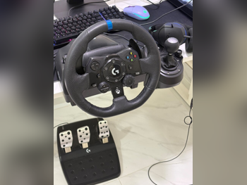 ملحقات اجهزة العاب الفيديو عجلة القيادة مع مغير السرع  - لوجيتك  - جي 29  - أسود