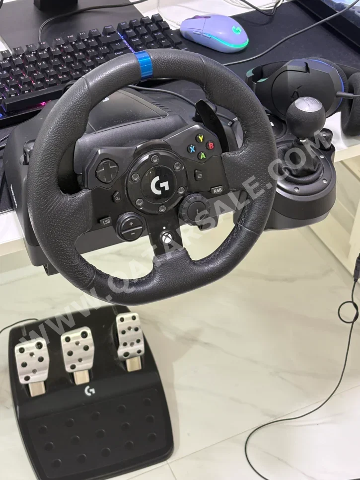 ملحقات اجهزة العاب الفيديو عجلة القيادة مع مغير السرع  - لوجيتك  - جي 29  - أسود