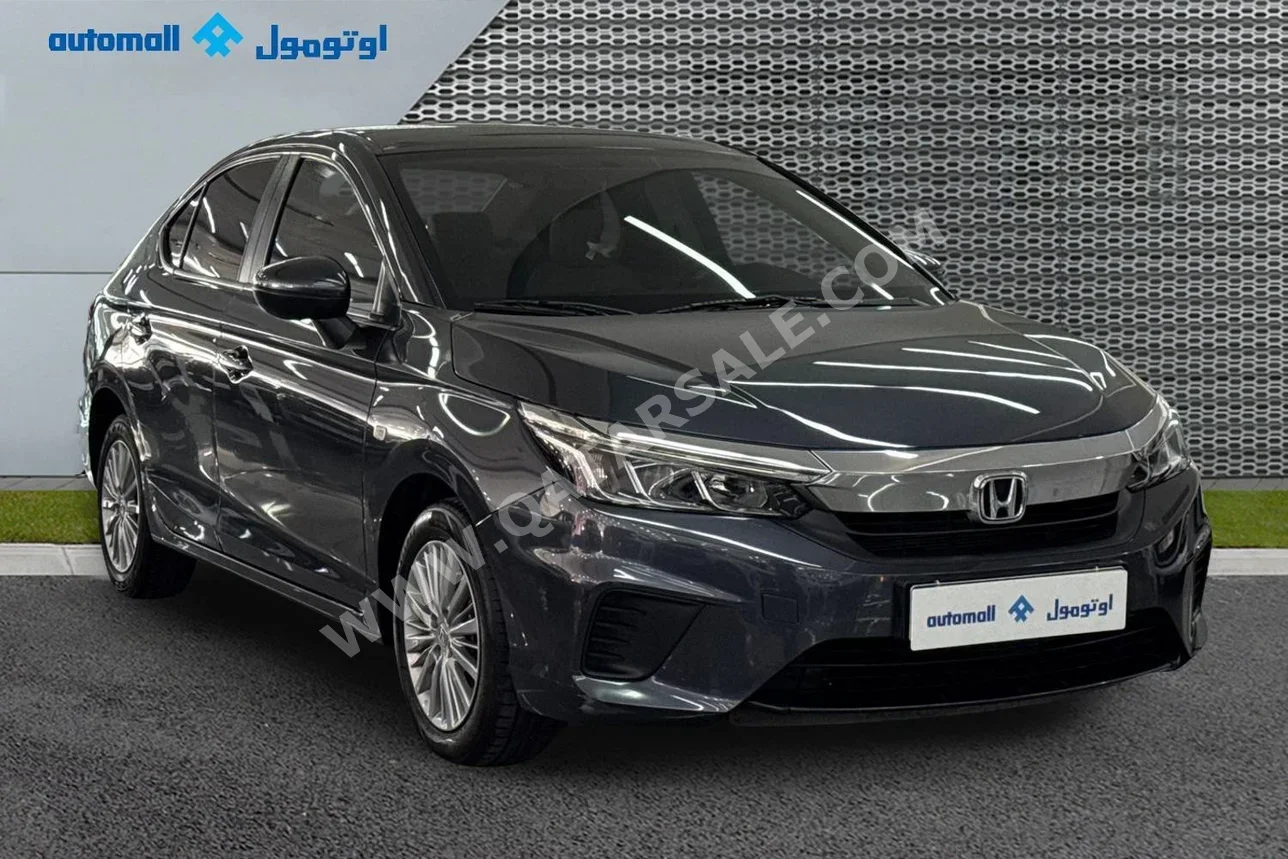 هوندا  سيتي  2023  اوتوماتيك  69,802 كم  4 سلندر  سحب امامي  سيدان  رمادي غامق  تحت الضمان