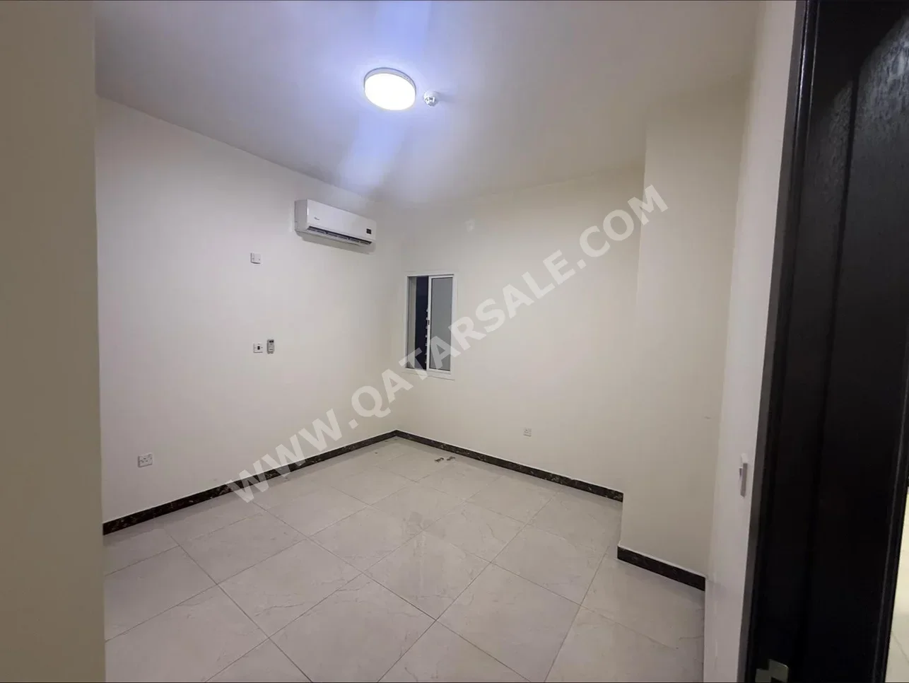 2 Bedrooms  Apartment  For Rent  in Doha -  Fereej Bin Mahmoud  Not Furnished