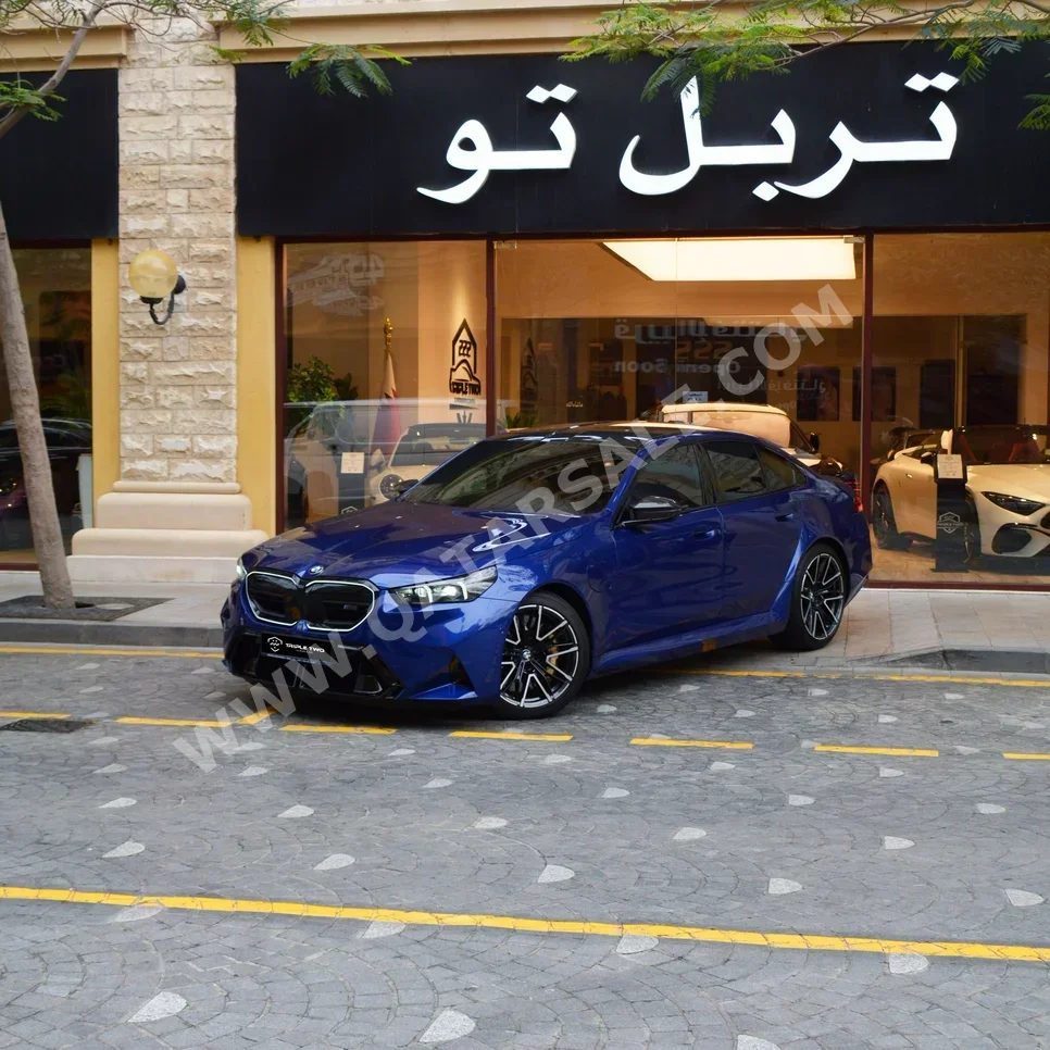 BMW  M-Series  5  2025  Automatic  14,300 Km  8 Cylinder  Rear Wheel Drive (RWD)  Sedan  Blue  With Warranty