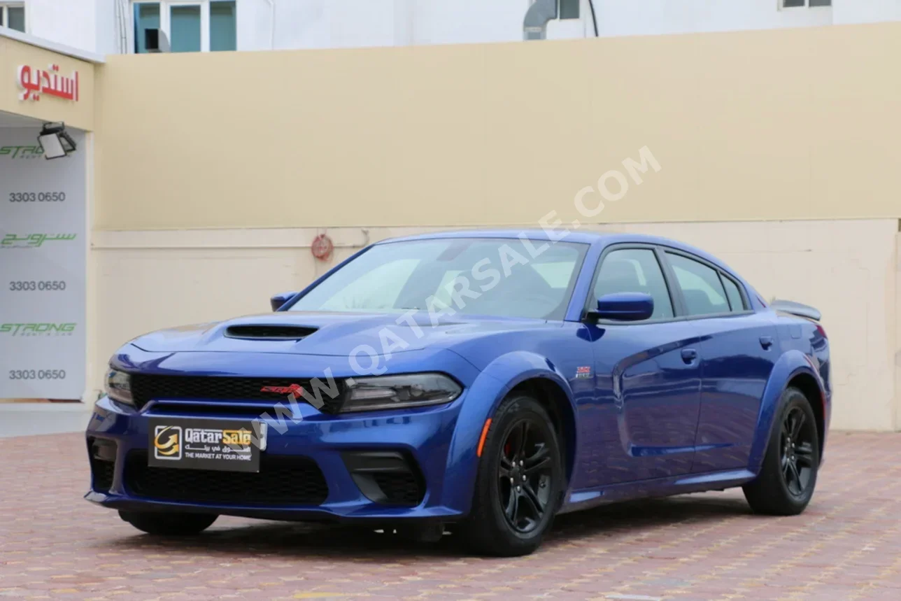 دودج  تشارجر  2022  اوتوماتيك  61,000 كم  6 سلندر  دفع خلفي  سيدان  ازرق