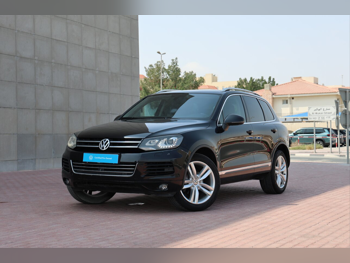 فوكس واغن  طوارق  سبورت  2013  اوتوماتيك  12,000 كم  6 سلندر  دفع كلي مستمر  اس يو في  أسود