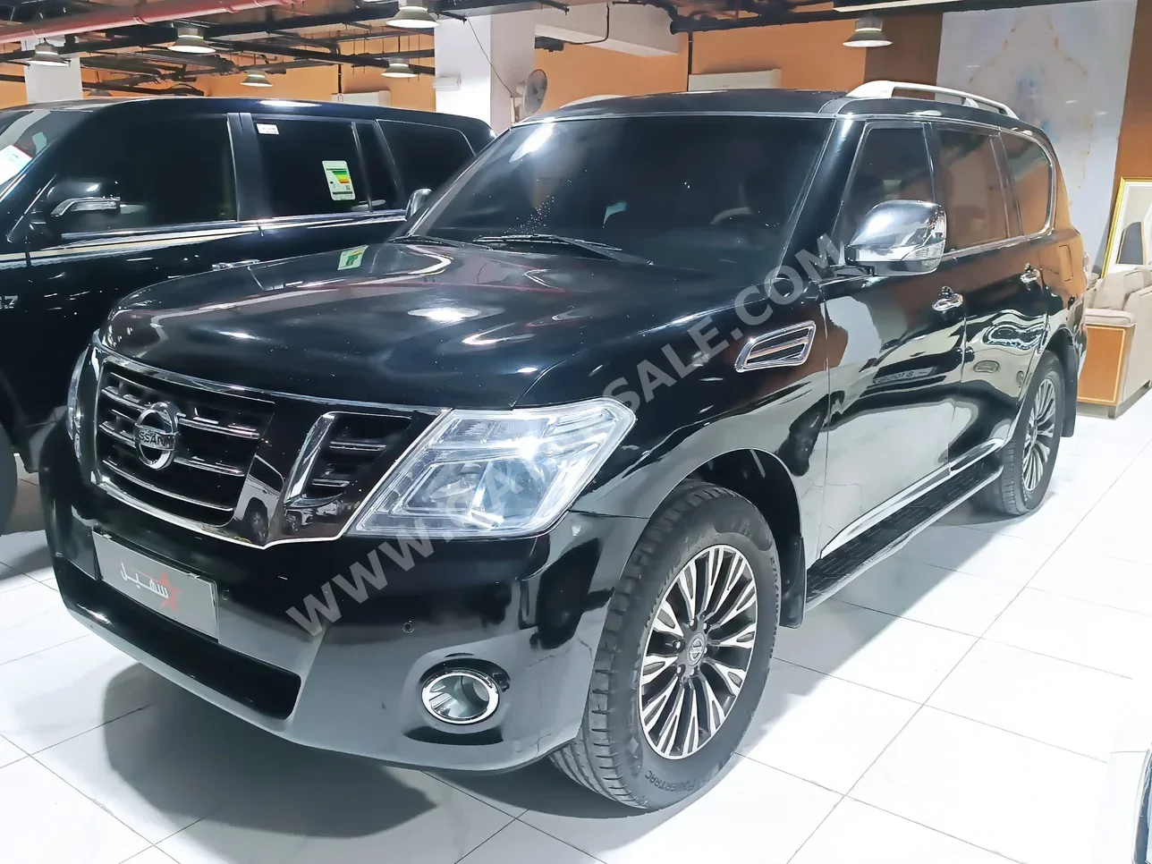 Nissan  Patrol  Platinum  2013  Automatic  205,032 Km  8 Cylinder  Four Wheel Drive (4WD)  SUV  Black
