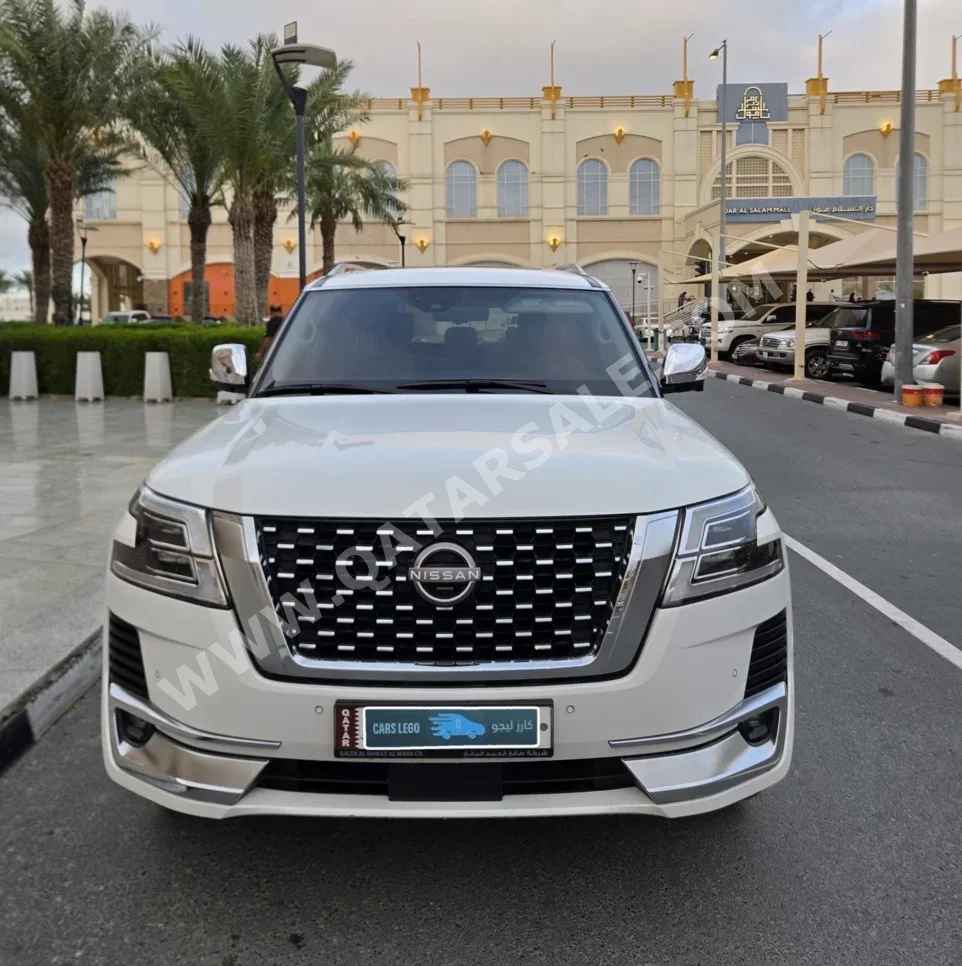 Nissan  Patrol  Platinum  2022  Automatic  55,000 Km  6 Cylinder  Four Wheel Drive (4WD)  SUV  Pearl