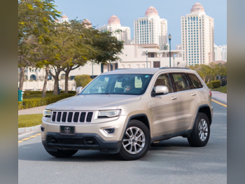 Jeep  Grand Cherokee  Laredo  2014  Automatic  159,000 Km  6 Cylinder  Four Wheel Drive (4WD)  SUV  Gold