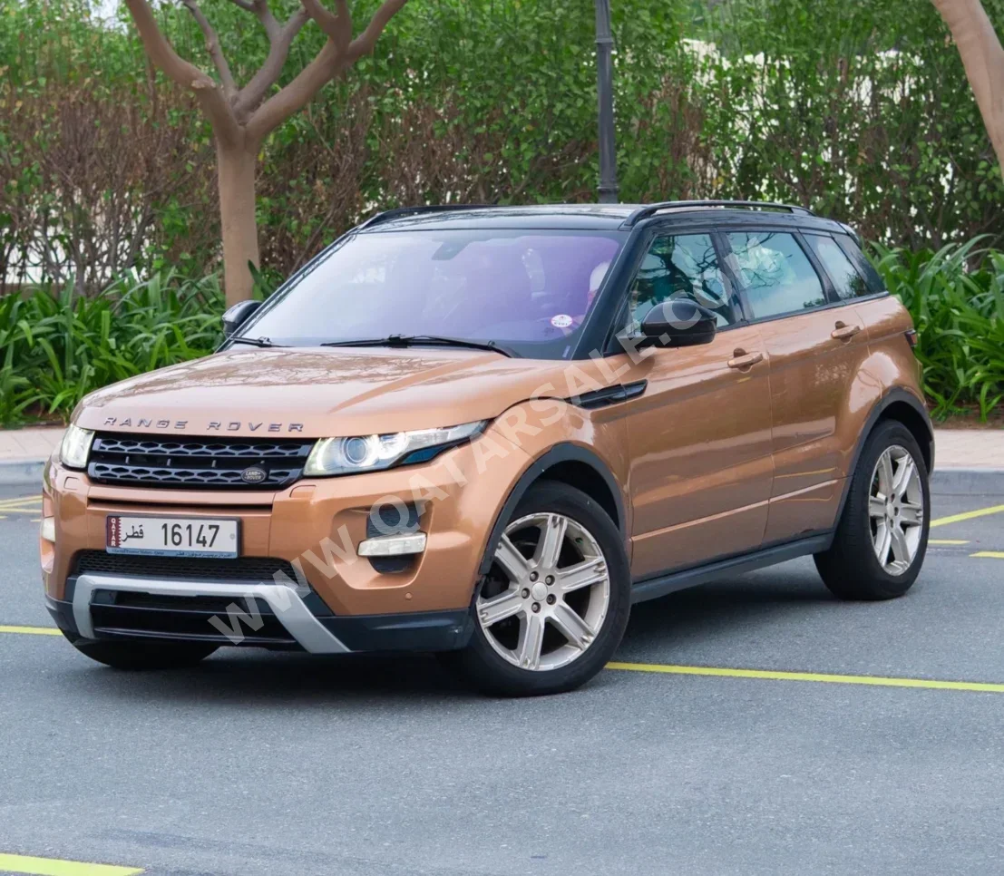 Land Rover  Evoque  Dynamic  2014  Automatic  189,000 Km  4 Cylinder  Four Wheel Drive (4WD)  SUV  Gold