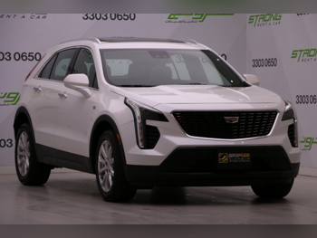 Cadillac  XT4  2022  Automatic  66,000 Km  4 Cylinder  Four Wheel Drive (4WD)  SUV  White  With Warranty