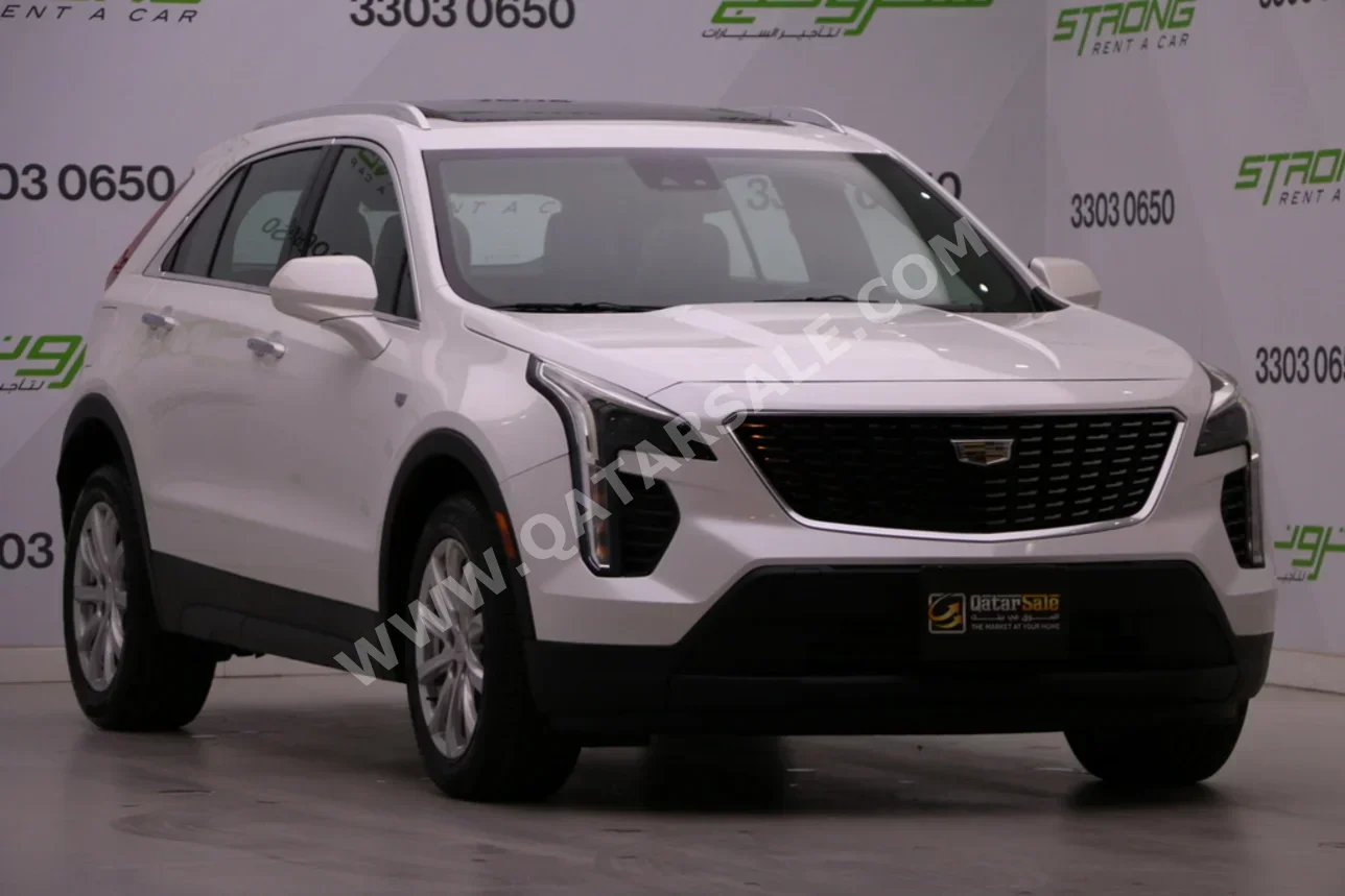 Cadillac  XT4  2022  Automatic  66,000 Km  4 Cylinder  Four Wheel Drive (4WD)  SUV  White  With Warranty