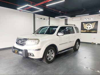 Honda  Pilot  EX  2015  Automatic  174,000 Km  4 Cylinder  Rear Wheel Drive (RWD)  SUV  White