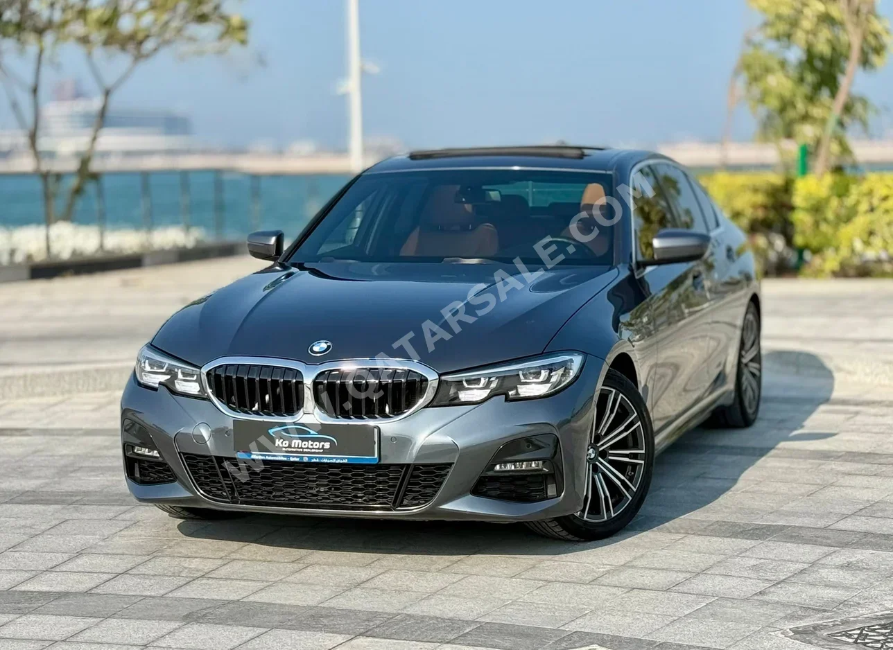BMW  3-Series  320i  2021  Automatic  69,000 Km  4 Cylinder  Rear Wheel Drive (RWD)  Sedan  Gray