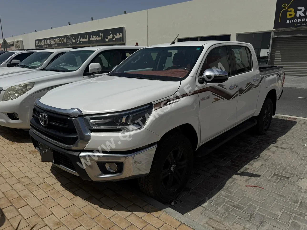 Toyota  Hilux  SR5  2024  Manual  88,000 Km  4 Cylinder  Four Wheel Drive (4WD)  Pick Up  White  With Warranty