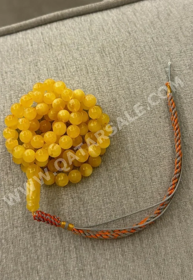 مسبحة كهرمان  أصفر  روسيا  البيضاوي / الدائرة