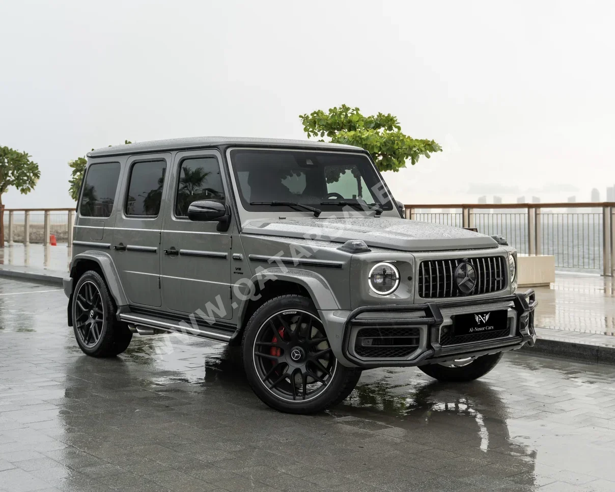 مرسيدس - بنز  جي - كلاس  63 اي ام جي  2022  اوتوماتيك  28,000 كم  8 سلندر  دفع رباعي  اس يو في  رمادي