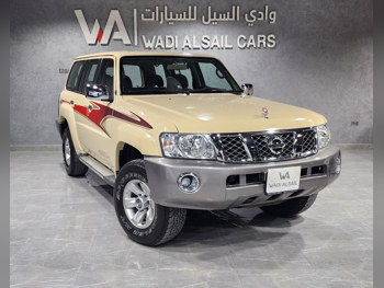 Nissan  Patrol  Safari  2015  Manual  235,000 Km  6 Cylinder  Four Wheel Drive (4WD)  SUV  Beige