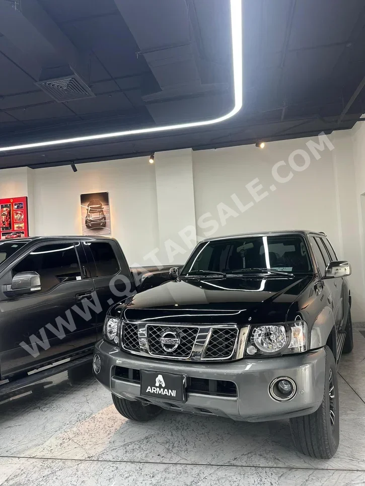 نيسان باترول سوبر سفاري 2024 اوتوماتيك 37,000 كم 6 سلندر دفع رباعي اس يو في أسود تحت الضمان