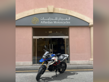 بي ام دبليو  جي 310 جي اس -  2024 - اللون ازرق وابيض -  الضمان