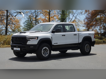 دودج  رام  1500 ار اتش او  2025  اوتوماتيك  0 كم  6 سلندر  دفع رباعي  بيكب  أبيض  تحت الضمان