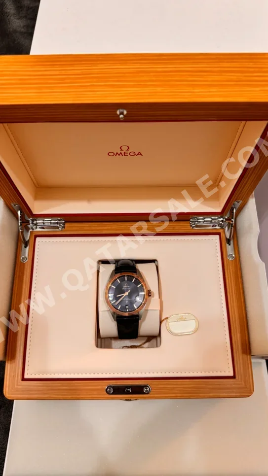 ساعات - أوميغا  - ساعات ميكانيكية  - متعدد الألوان  - ساعات للجنسين