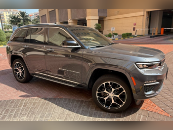 Jeep  Grand Cherokee  Summit  2023  Automatic  7,000 Km  4 Cylinder  Four Wheel Drive (4WD)  SUV  Gray and Black  With Warranty