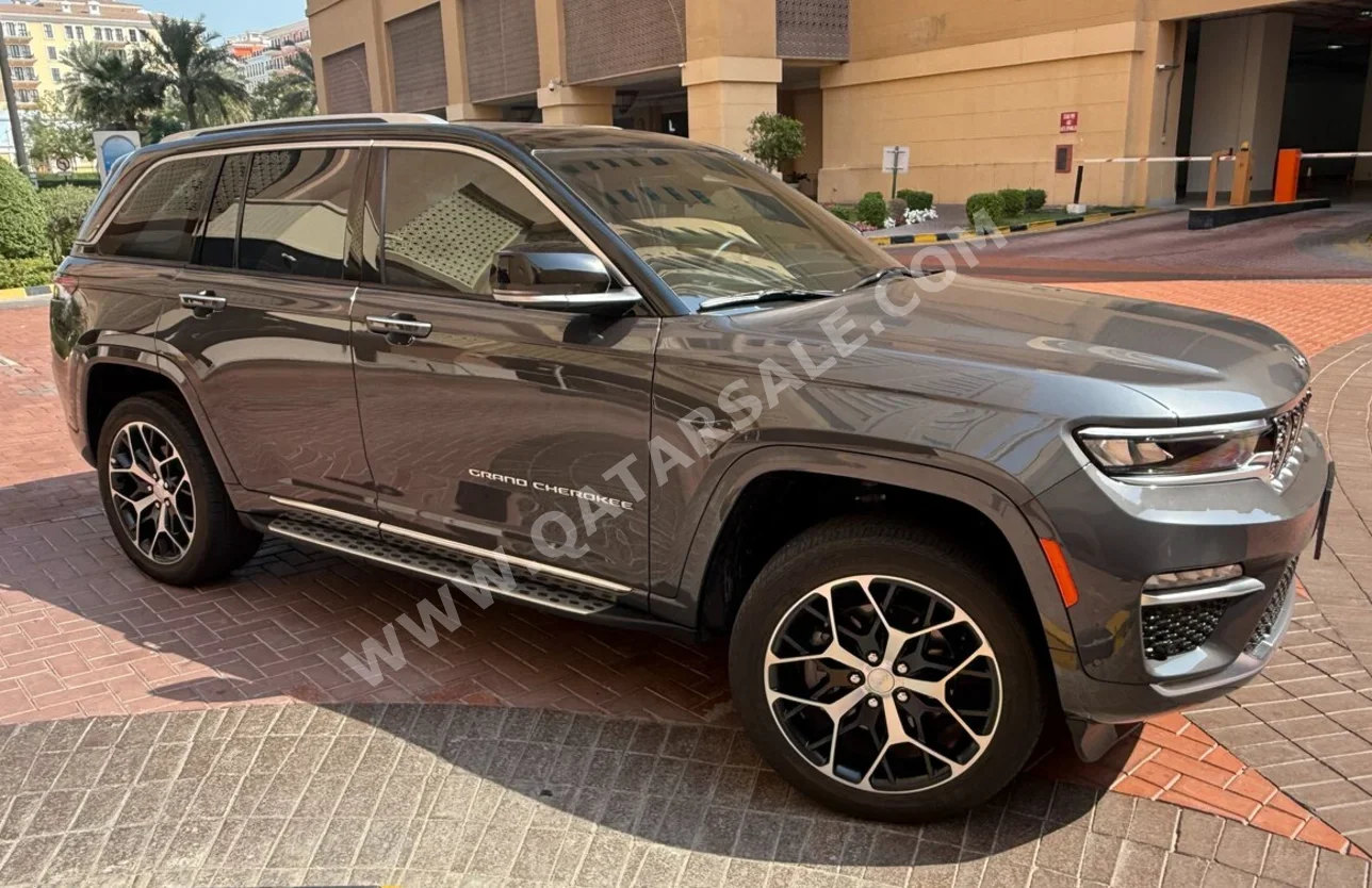 Jeep  Grand Cherokee  Summit  2023  Automatic  7,000 Km  4 Cylinder  Four Wheel Drive (4WD)  SUV  Gray and Black  With Warranty