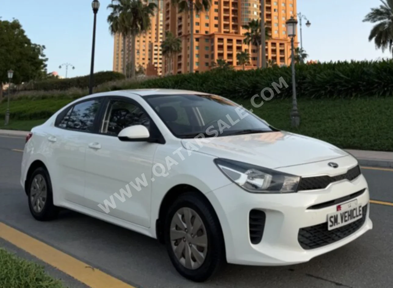 Kia  Rio  2020  Automatic  47,000 Km  4 Cylinder  Front Wheel Drive (FWD)  Sedan  White