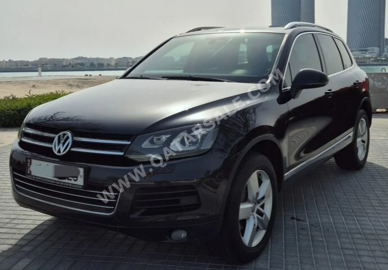 Volkswagen  Touareg  2015  Automatic  115,500 Km  6 Cylinder  All Wheel Drive (AWD)  SUV  Black