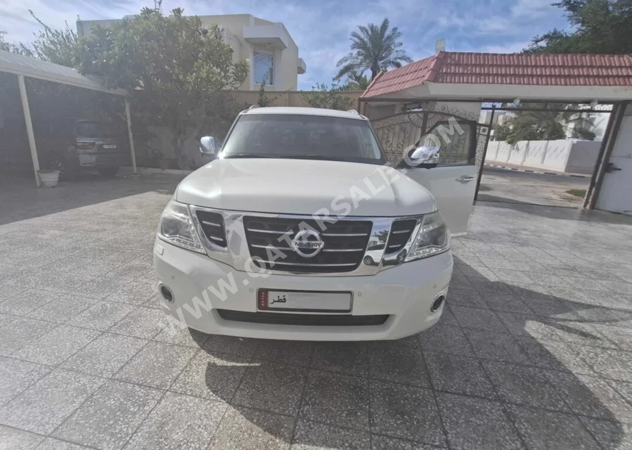 Nissan  Patrol  SE Platinum  2017  Automatic  26,718 Km  6 Cylinder  Four Wheel Drive (4WD)  SUV  White