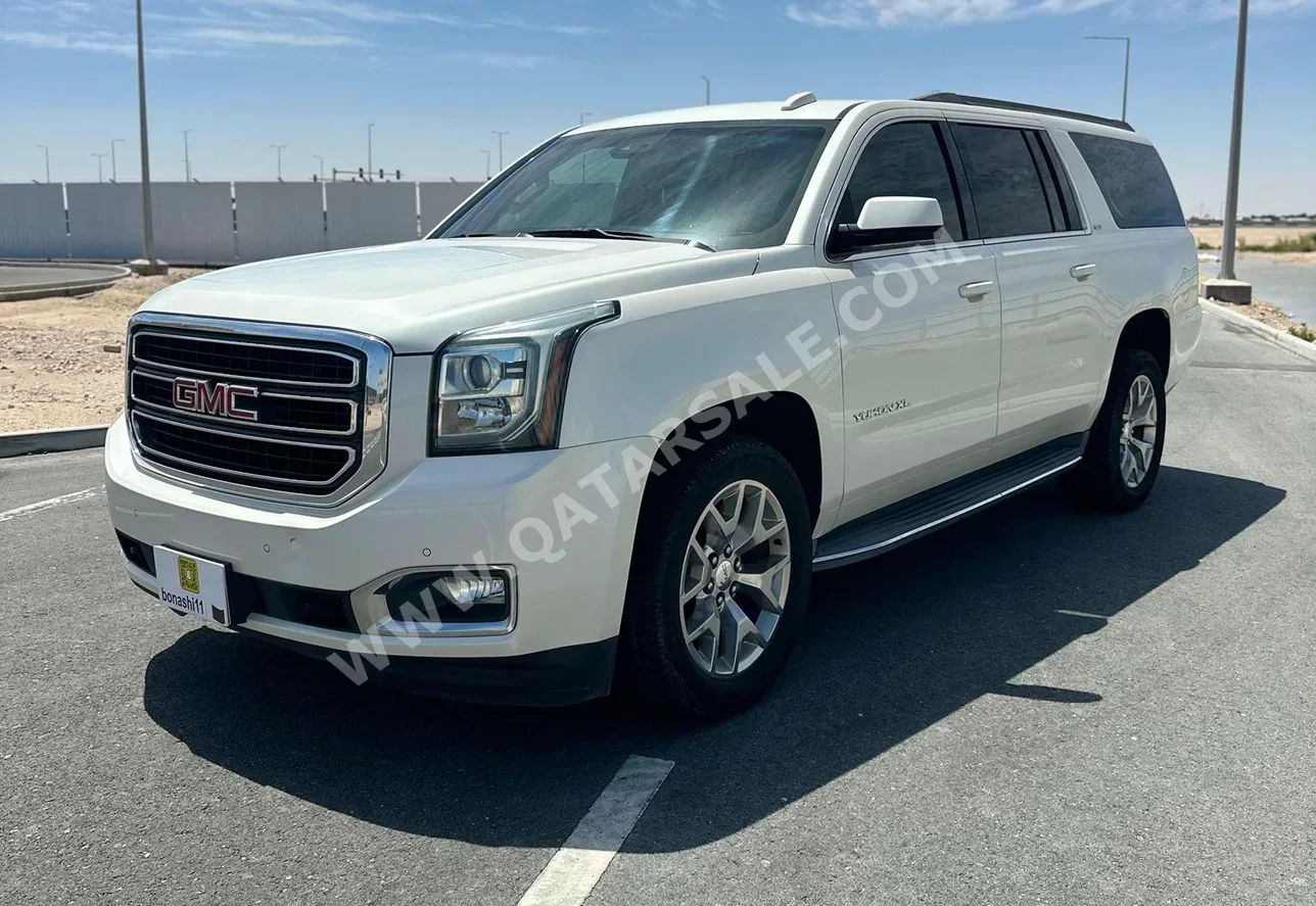 جي ام سي  يوكون  اس ال تي  2015  اوتوماتيك  246,096 كم  8 سلندر  دفع رباعي  اس يو في  أبيض