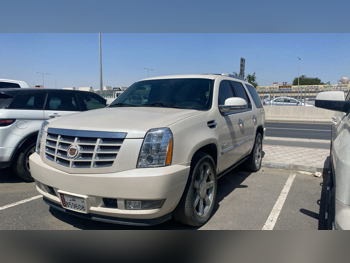 Cadillac  Escalade  2012  Automatic  129,000 Km  8 Cylinder  Four Wheel Drive (4WD)  SUV  White