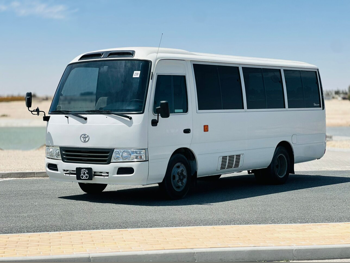 Toyota  Coaster  2012  Manual  137,000 Km  4 Cylinder  Rear Wheel Drive (RWD)  Van / Bus  White